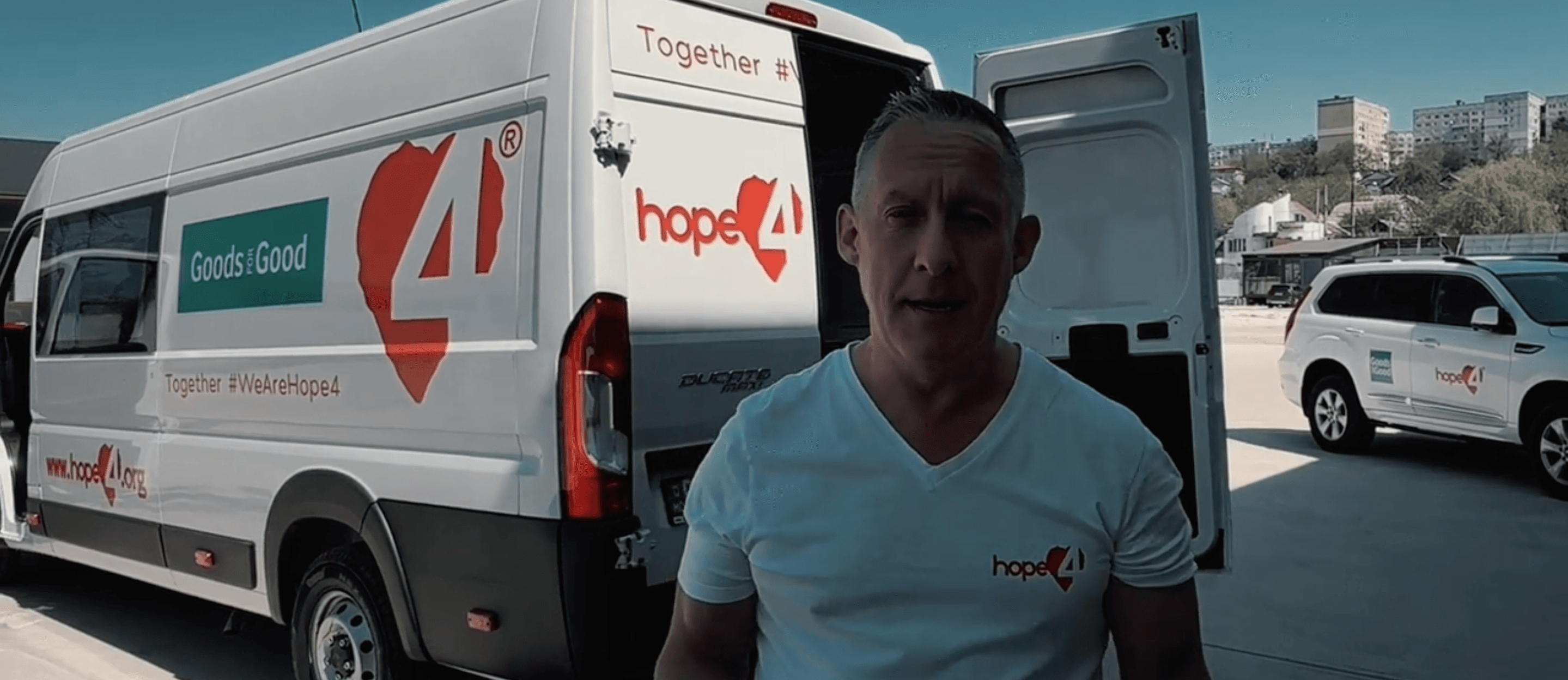 Hope4 team with branded delivery van ready for field operations