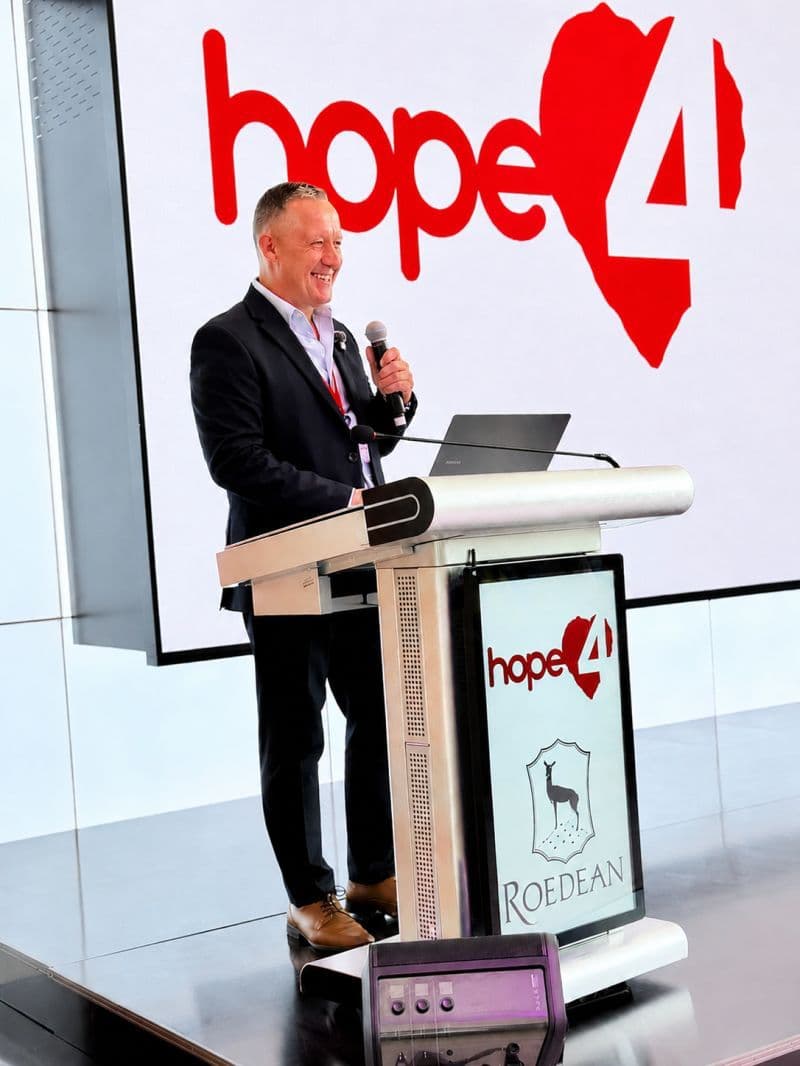 Hope4 founder speaking at a partnership event